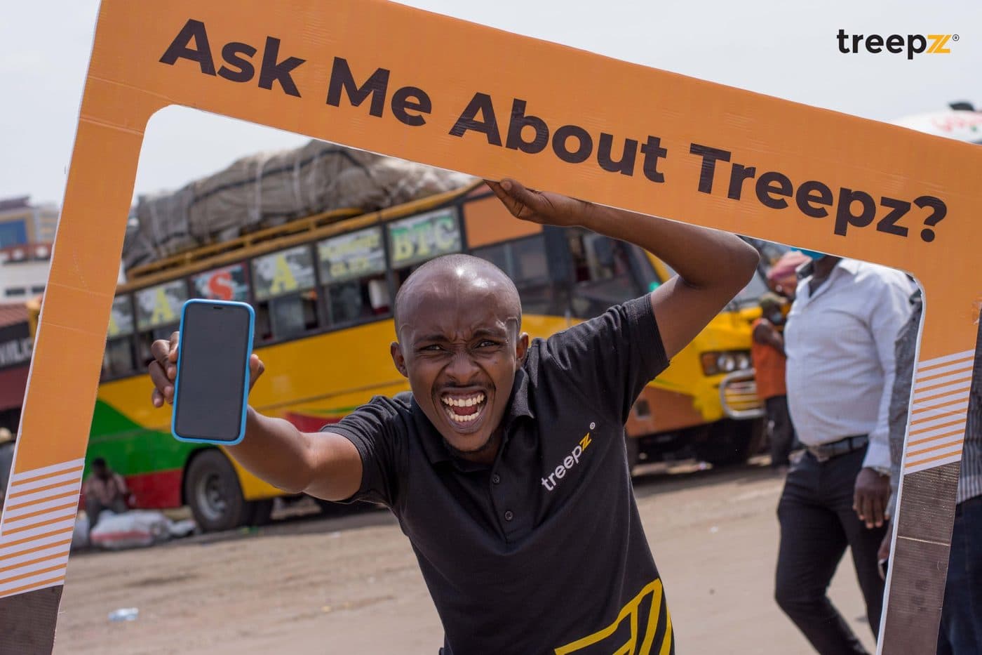 Hakiza Ronald. Selling online bus tickets at a Kampala bus park, before anyone believed in them.